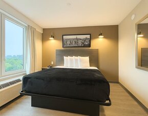 Queen room at LIV Hotel Bronx.