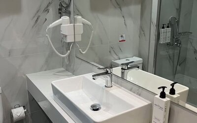 Guest bathroom at Boss Boutique Athens.