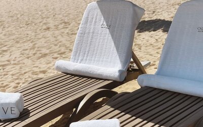 Beach loungers at Aire De O:live.