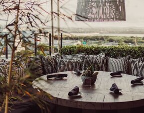 Outdoor dining and terrace at Aire De O:live.