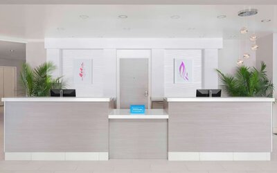 Front desk at Hilton Garden Inn Calgary Airport.