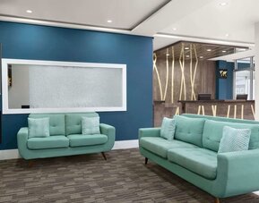 Lobby and lounge at Days Inn By Wyndham Saint John New Brunswick.