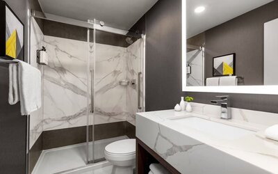 Guest bathroom at Crowne Plaza Saint John Harbour View By IHG.