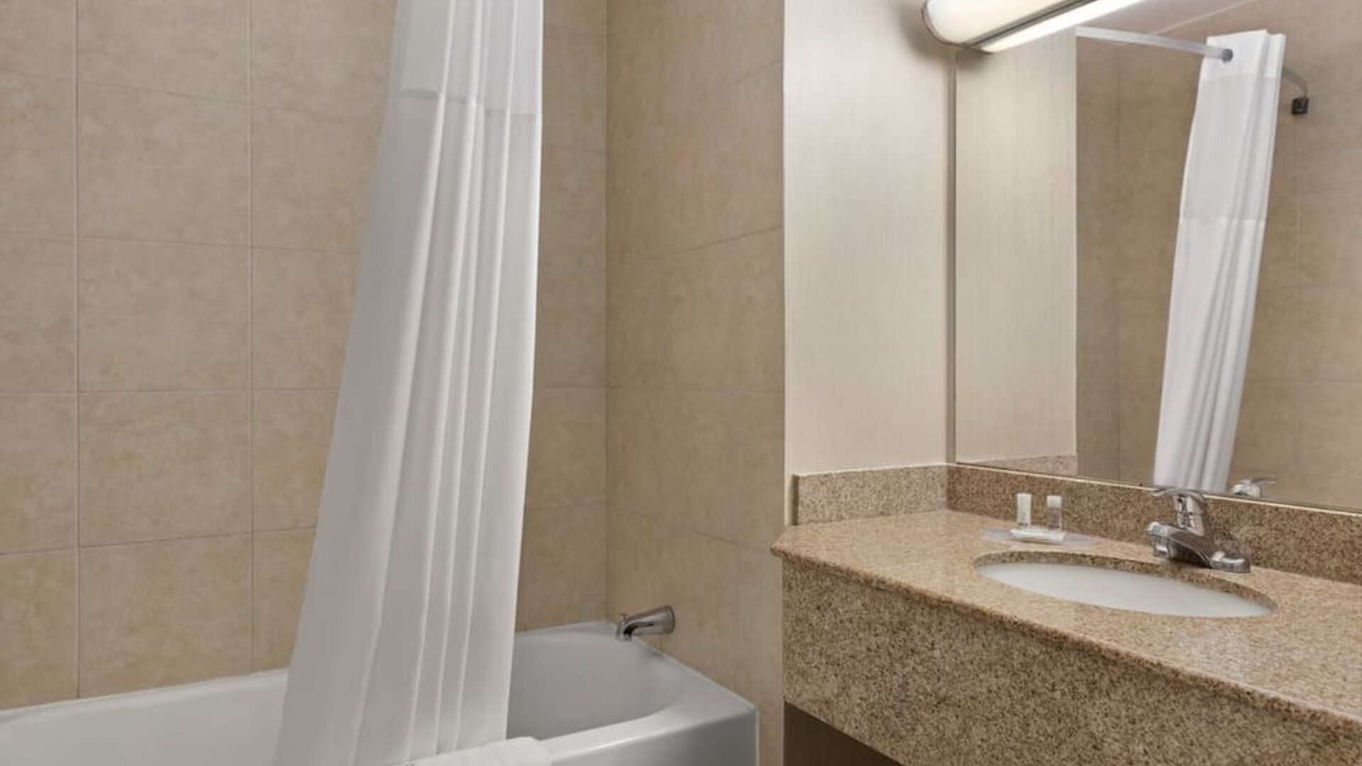 Guest bathroom at Days Inn By Wyndham London.