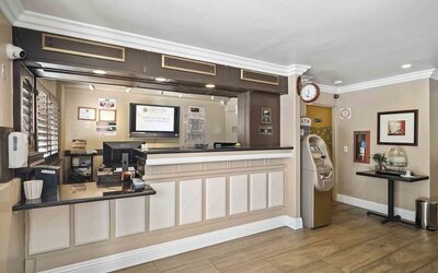 Reception desk at Lemon Tree Hotel & Suites Anaheim.
