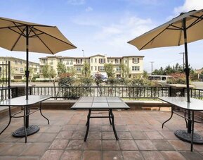 Outdoor terrace at Lemon Tree Hotel & Suites Anaheim.