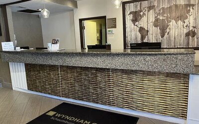 Reception desk at Wyndham Garden Schaumburg Chicago Northwest.