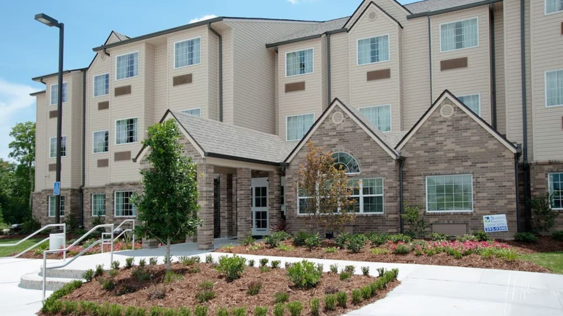 Hotel exterior at WeStay Suites Belle Chasse.