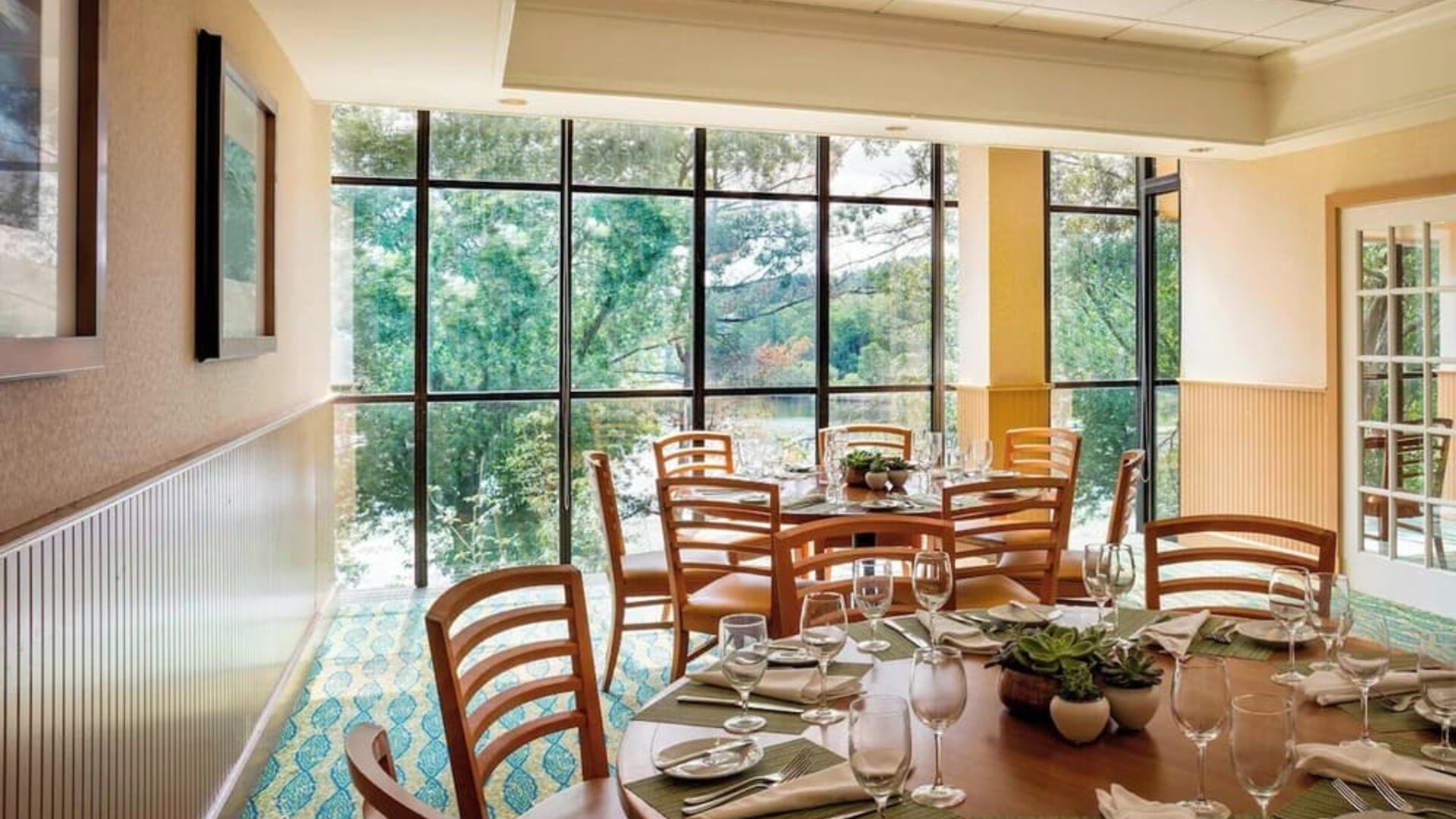 Dining area with natural light perfect for coworking at Boston Marriott Newton.