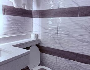 Guest bathroom at THE VINE HOTEL BRONX.