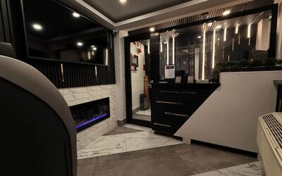 Reception desk at THE VINE HOTEL BRONX.