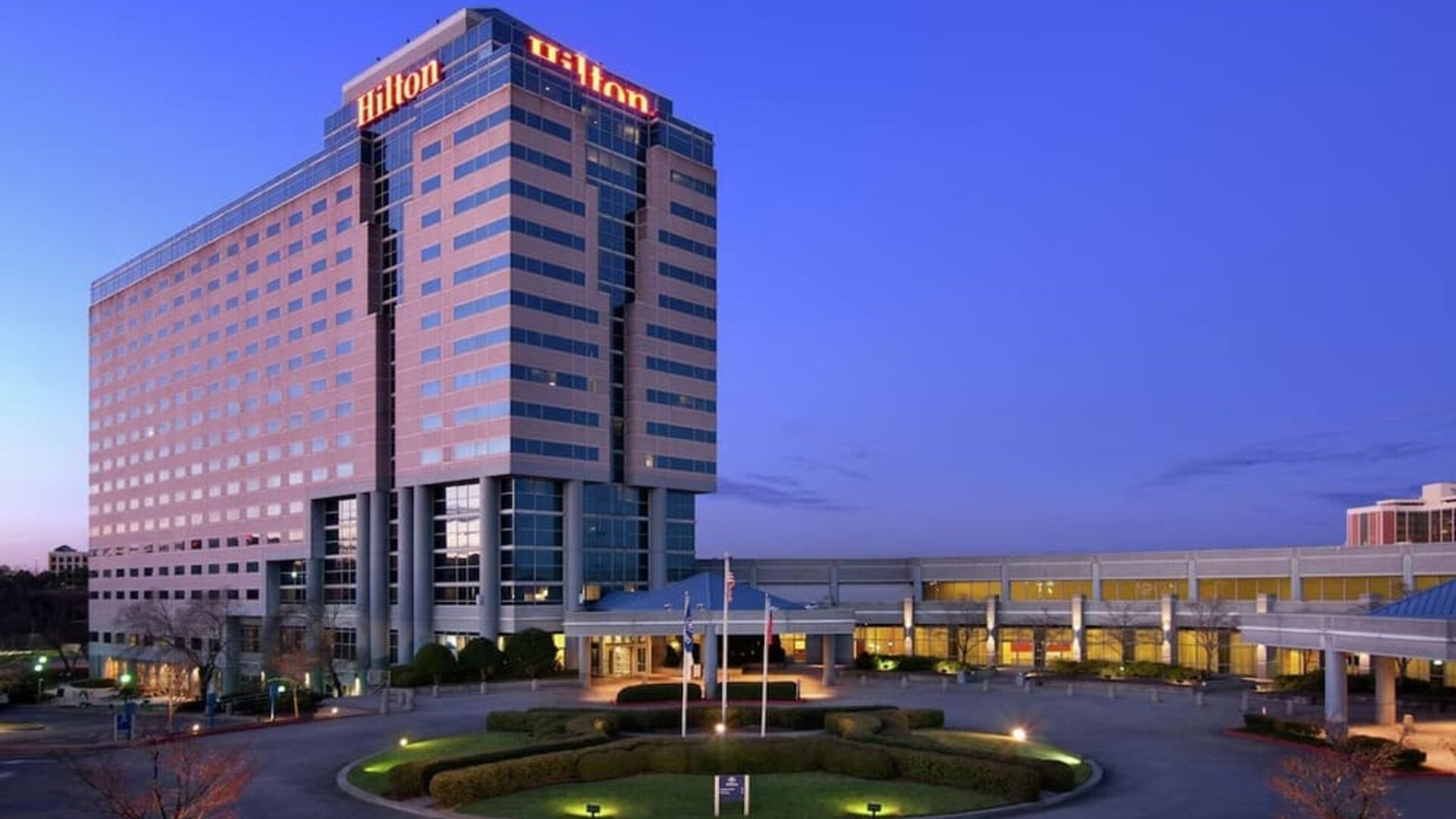 Hotel exterior at Hilton Atlanta Airport.