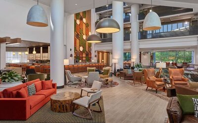 Lobby and lounge at Hilton Atlanta Airport.