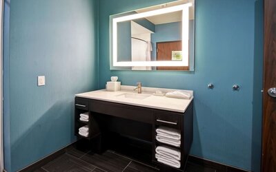 Guest bathroom at Home2 Suites By Hilton El Reno.
