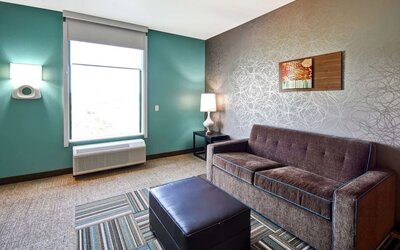TV lounge area at Home2 Suites By Hilton El Reno.