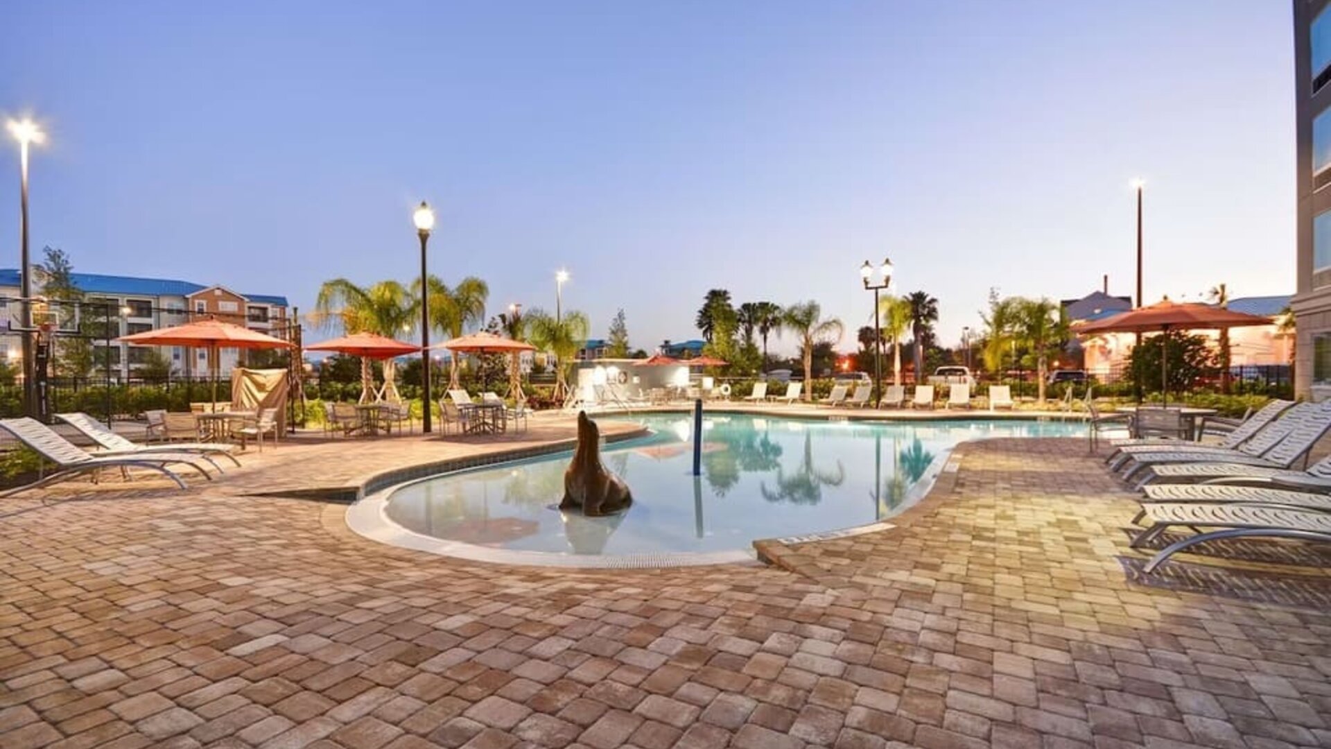 Outdoor pool at Homewood Suites By Hilton Orlando Theme Parks.
