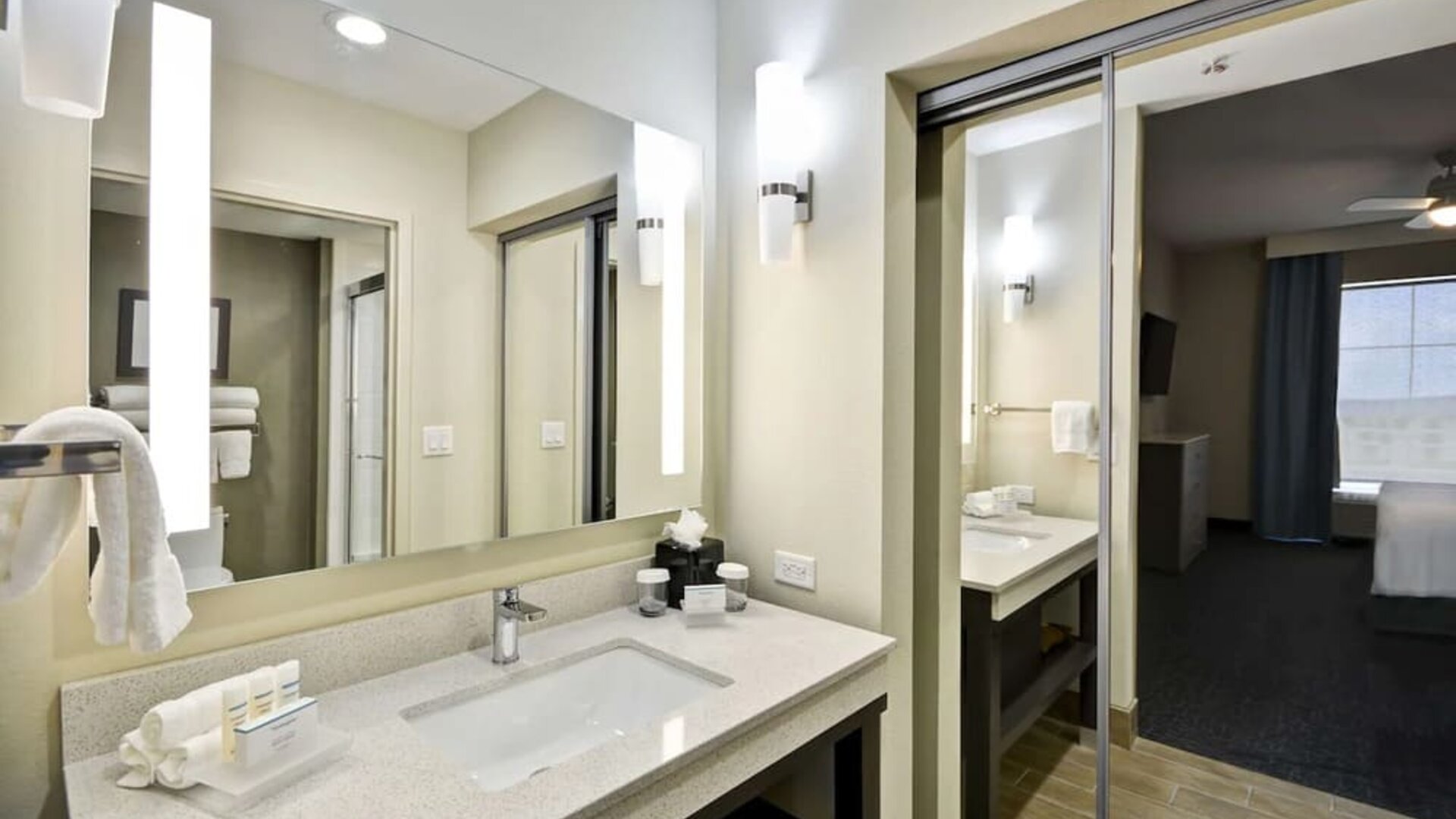 Guest bathroom at Homewood Suites By Hilton Orlando Theme Parks.