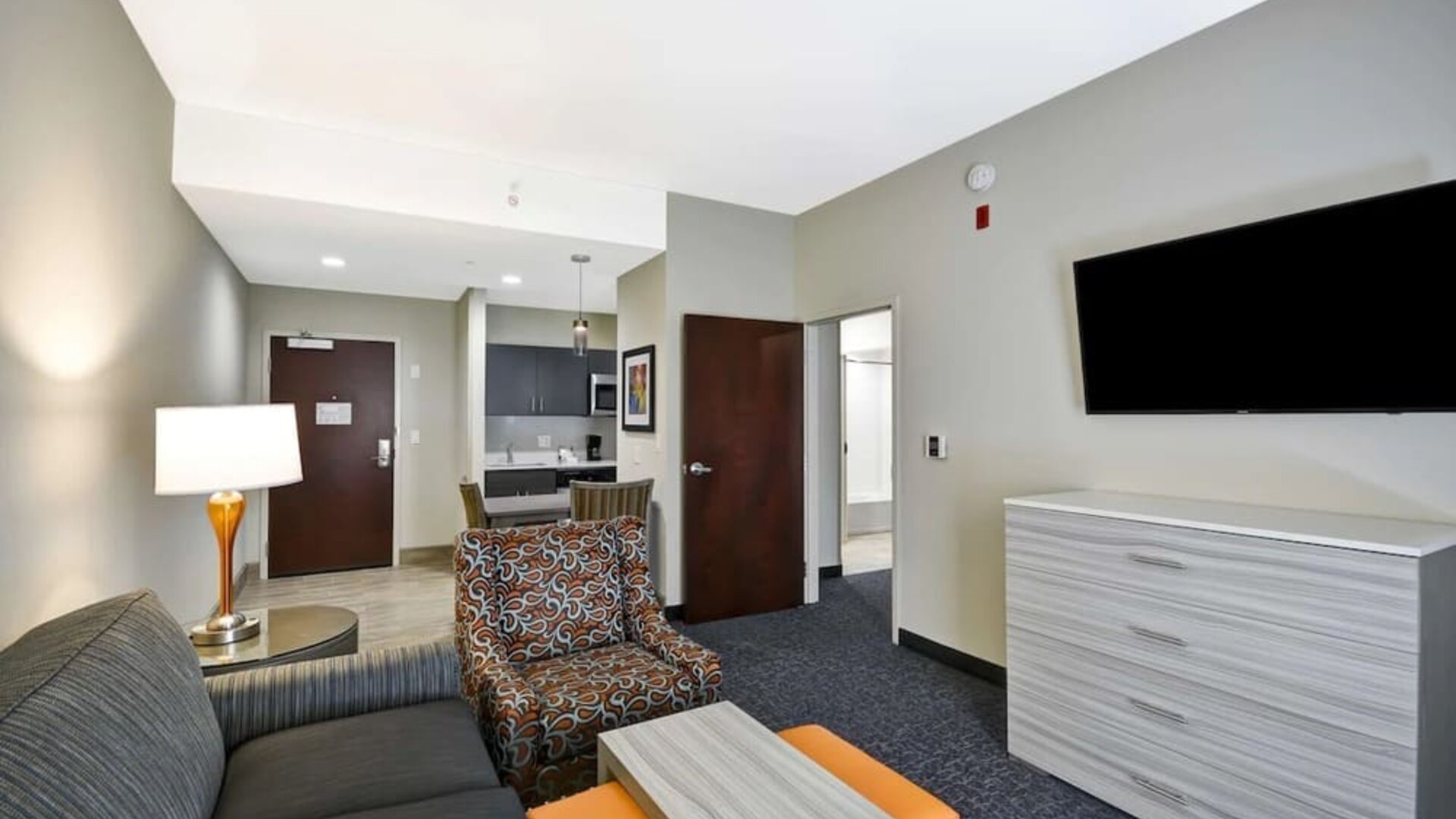 Lounge area at Homewood Suites By Hilton Orlando Theme Parks.