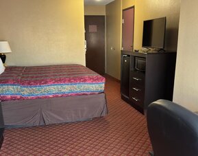 Day use room at Coratel Inn & Suites By Jasper Santa Fe OKC.