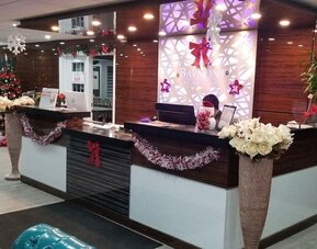 Reception desk at Baymont By Wyndham Montreal Airport.