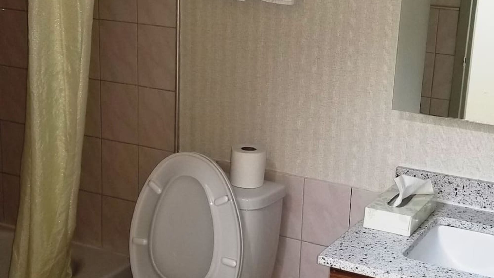 Guest bathroom at Baymont By Wyndham Montreal Airport.