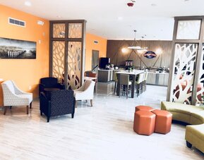 Lobby seating at Baymont By Wyndham Houston Hobby Airport.