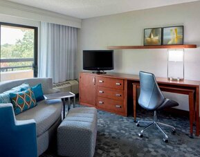 Day room with work desk at Sonesta Select Raleigh Durham Airport Morrisville.