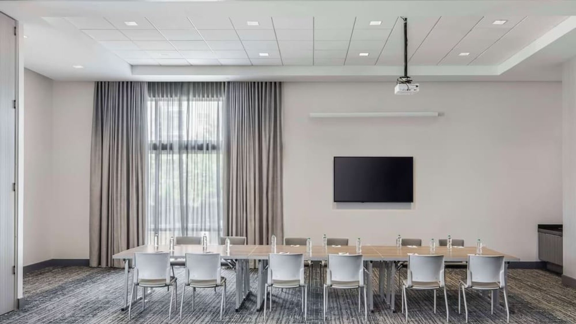 Meeting room at Embassy Suites By Hilton Atlanta Midtown.