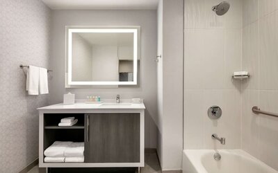 Guest bathroom at Embassy Suites By Hilton Atlanta Midtown.