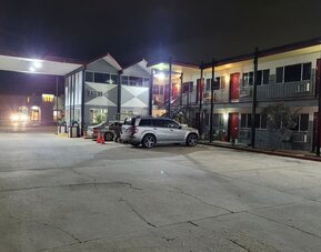 Parking available at Coratel Inn & Suites By Jasper Hutchinson.