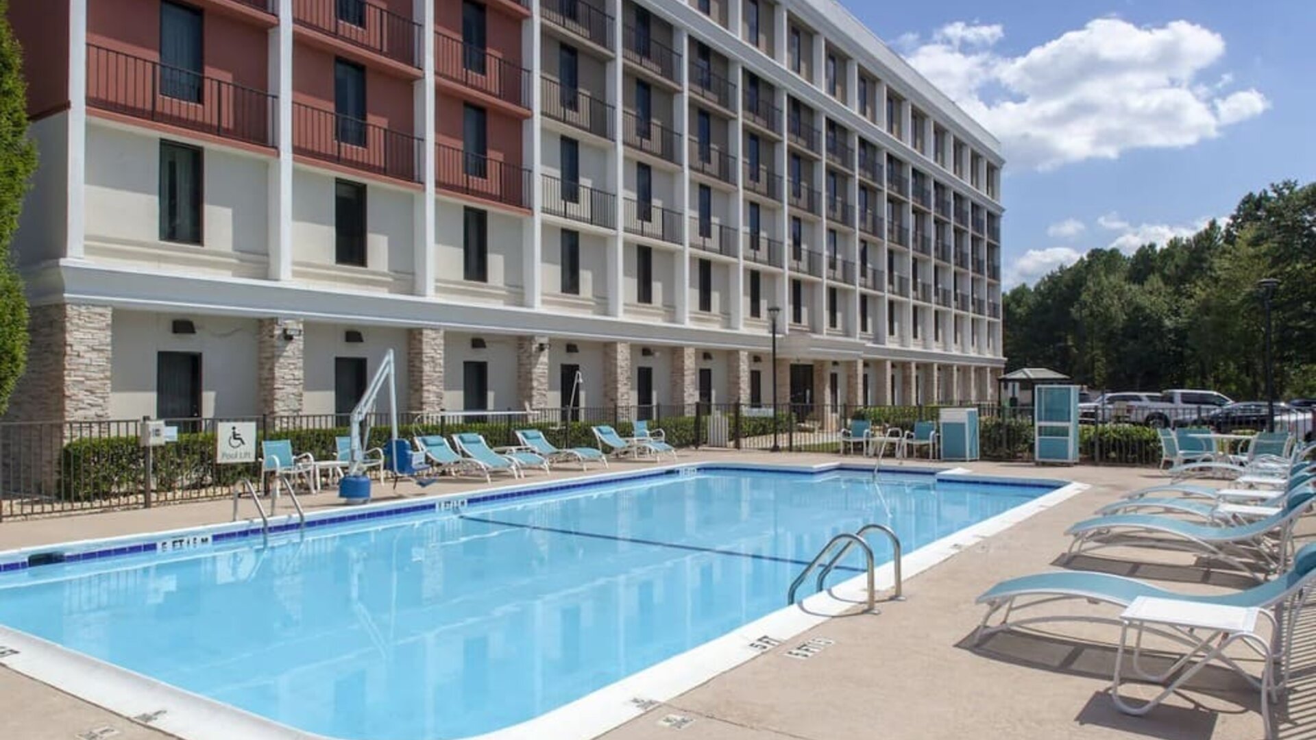 Outdoor pool at Holiday Inn Express Atlanta Airport - College Park By IHG.
