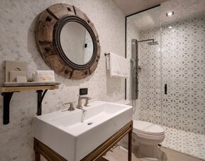 Guest bathroom at Olive Boutique Hotel.