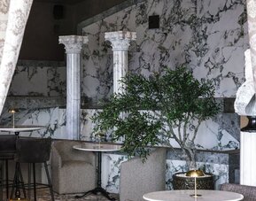 Dining area at Olive Boutique Hotel.