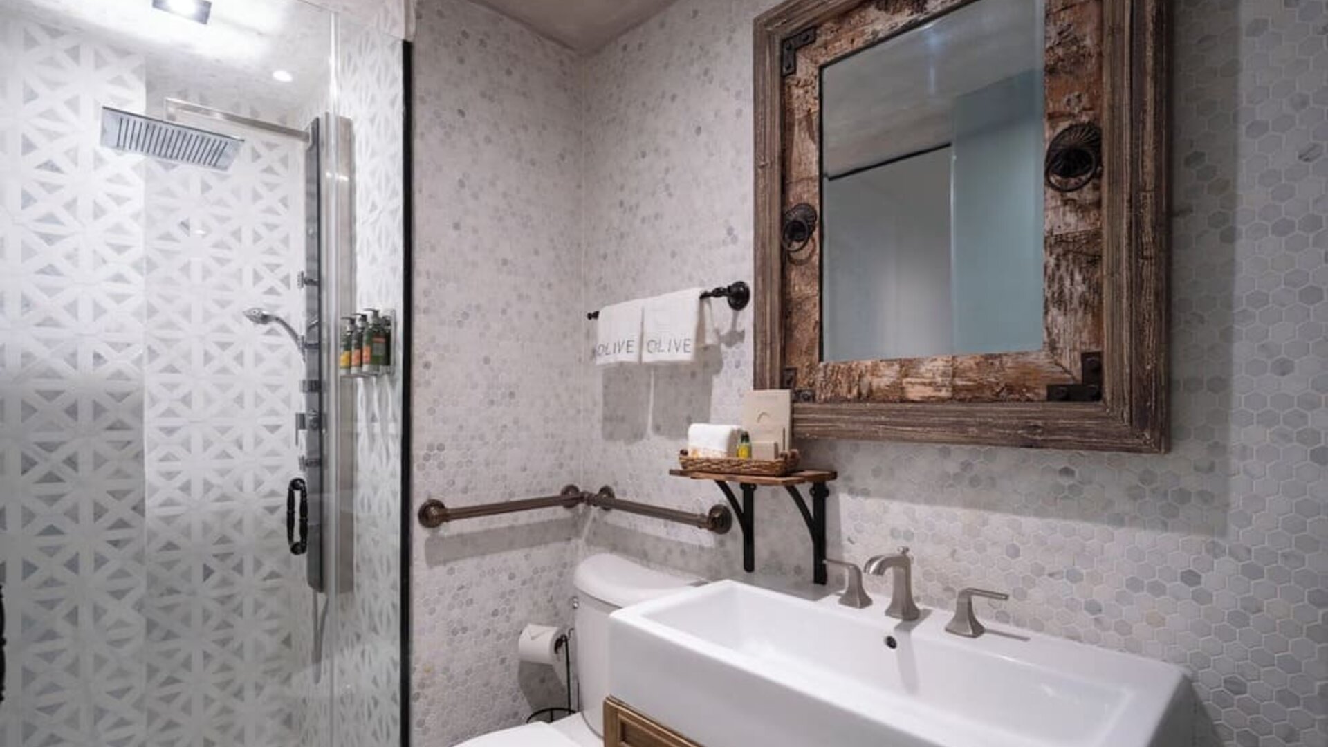 Guest bathroom at Olive Boutique Hotel.