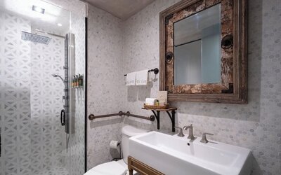 Guest bathroom at Olive Boutique Hotel.