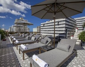 Lounge chairs at O:LV HOTEL.