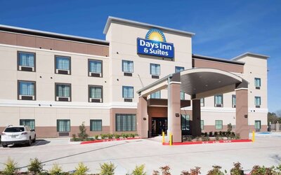 Hotel exterior at Days Inn & Suites By Wyndham Houston NW Cypress.