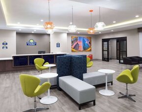 Lobby seating at Days Inn & Suites By Wyndham Houston NW Cypress.