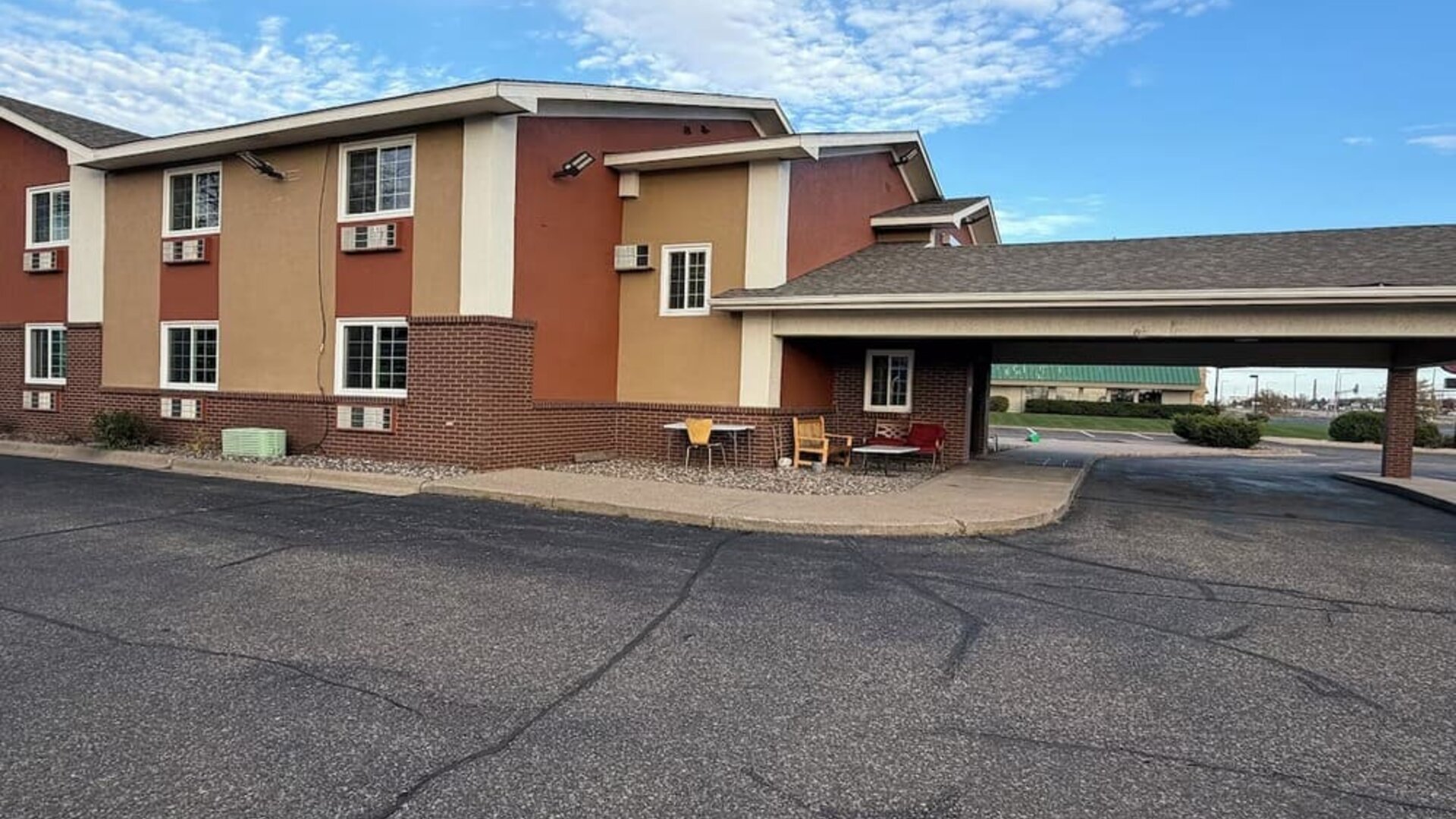 Hotel exterior at Coratel Inn And Suites By Jasper Stillwater.
