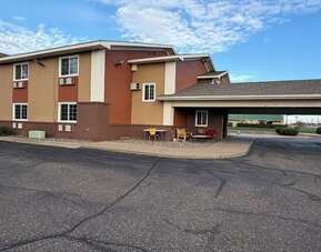 Hotel exterior at Coratel Inn And Suites By Jasper Stillwater.