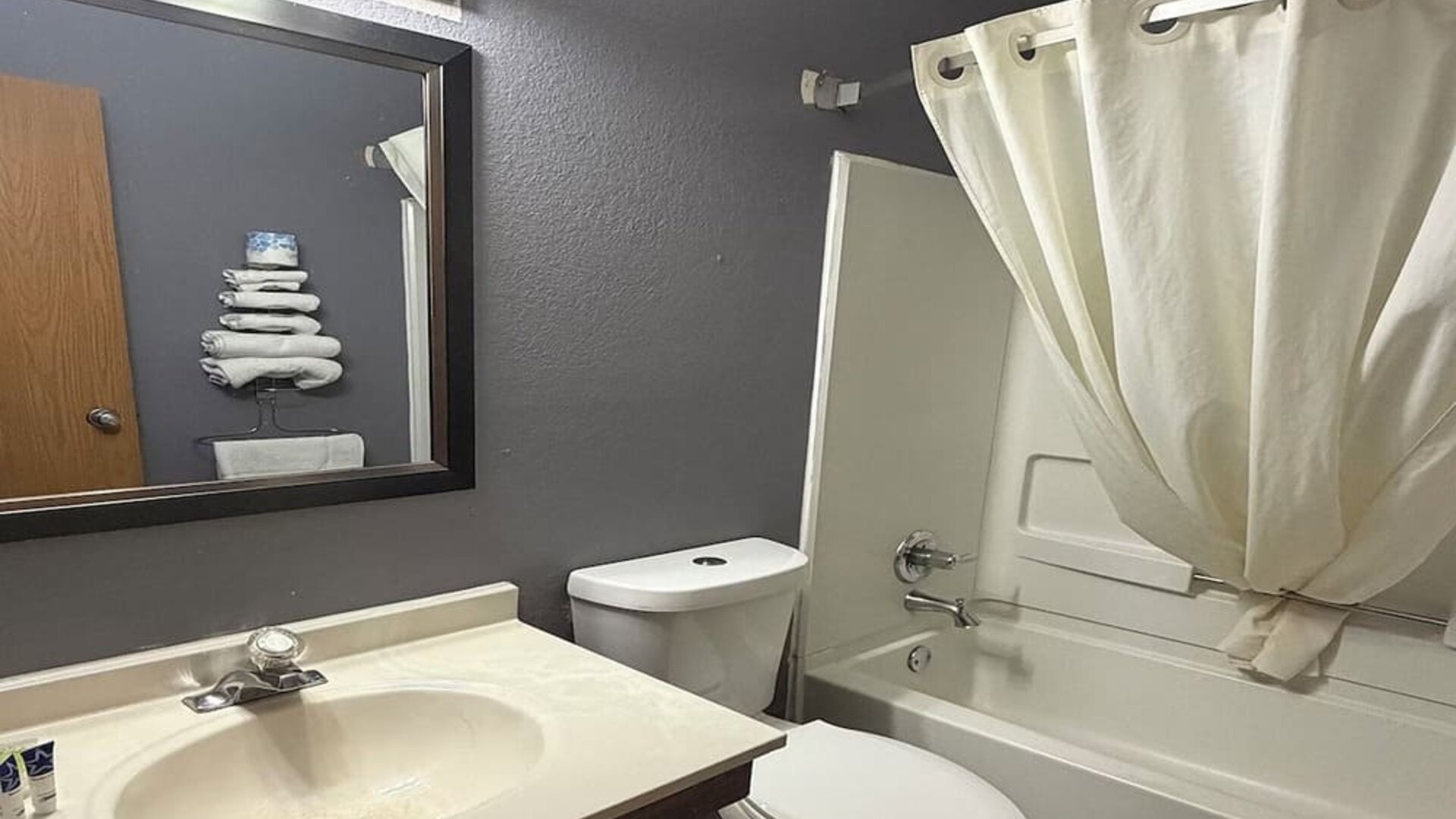 Guest bathroom at Coratel Inn And Suites By Jasper Stillwater.