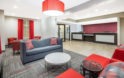 Lobby seating at Ramada By Wyndham Alpharetta/Atlanta North.