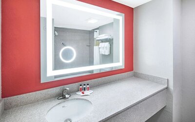 Guest bathroom at Ramada By Wyndham Alpharetta/Atlanta North.