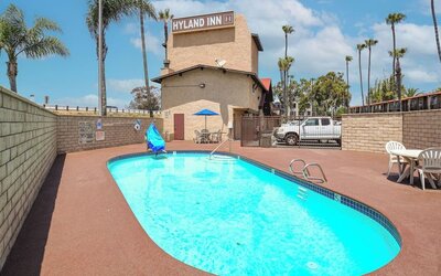Outdoor pool at Hyland Inn Near Legoland.