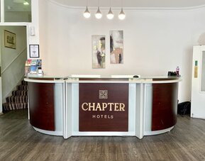 Front desk at The Chapter - Leisure Inn Hotel.
