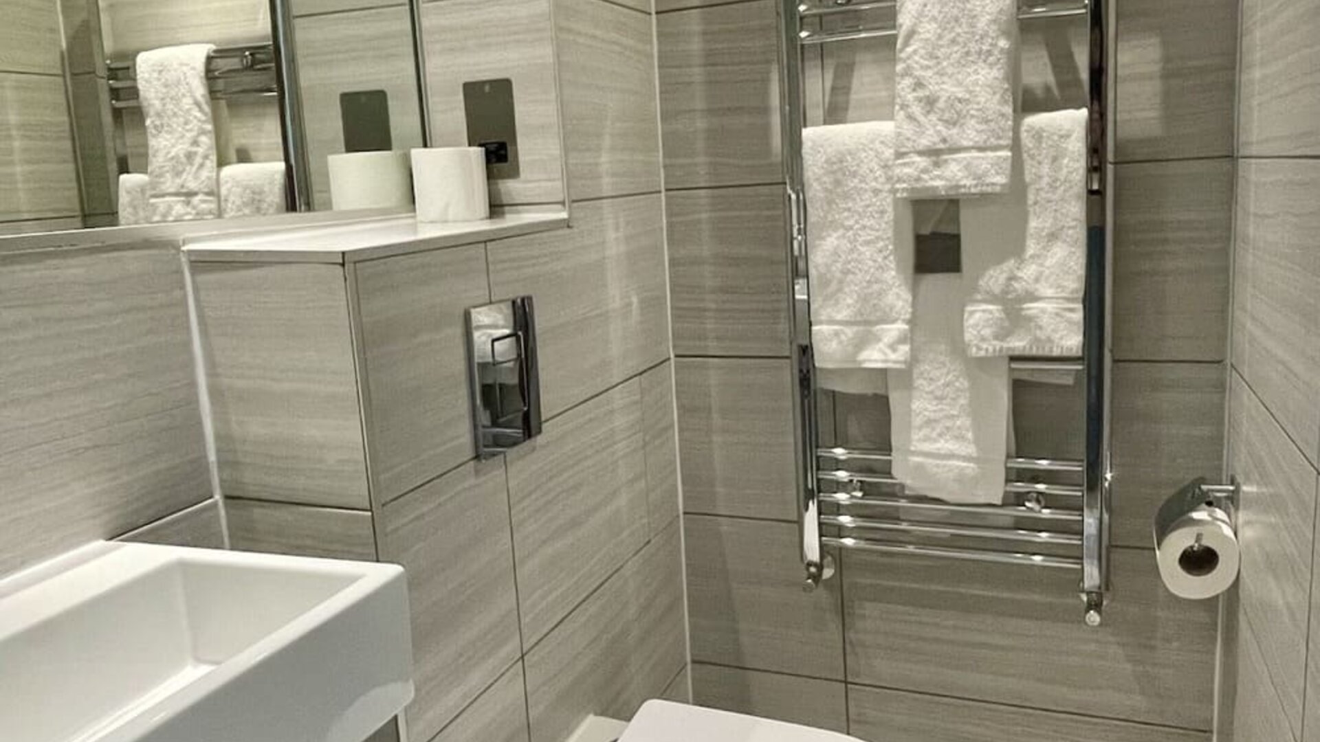 Guest bathroom at The Chapter - Leisure Inn Hotel.