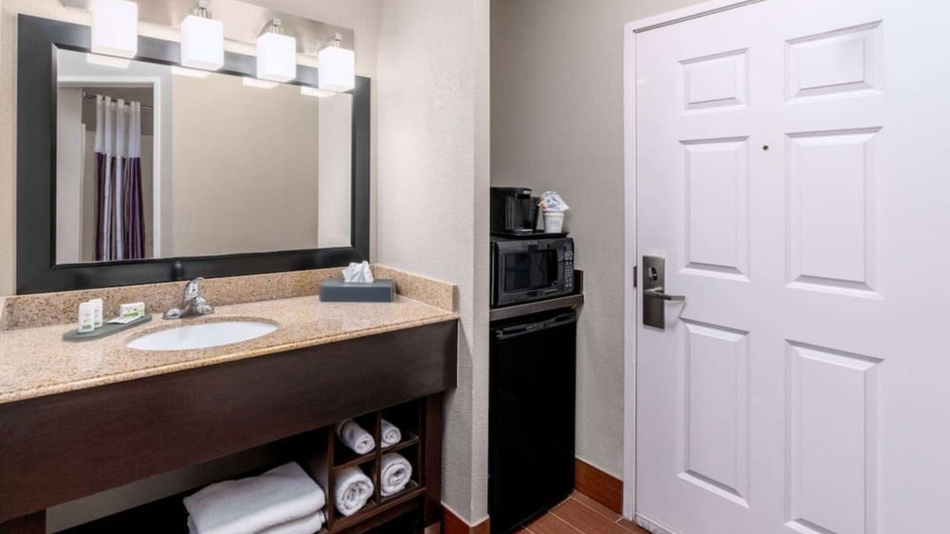 Guest bathroom at La Quinta Inn & Suites By Wyndham Roswell.