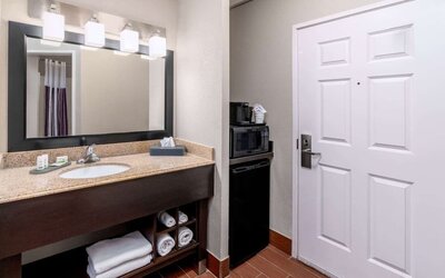 Guest bathroom at La Quinta Inn & Suites By Wyndham Roswell.