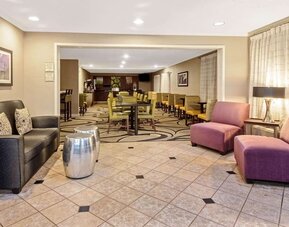 Lobby and coworking space at La Quinta Inn & Suites By Wyndham Harrisburg Airport Hershey.