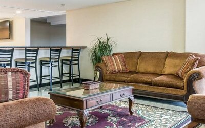 Lobby and coworking area at Clarion Inn I-94 Near Expo Center.